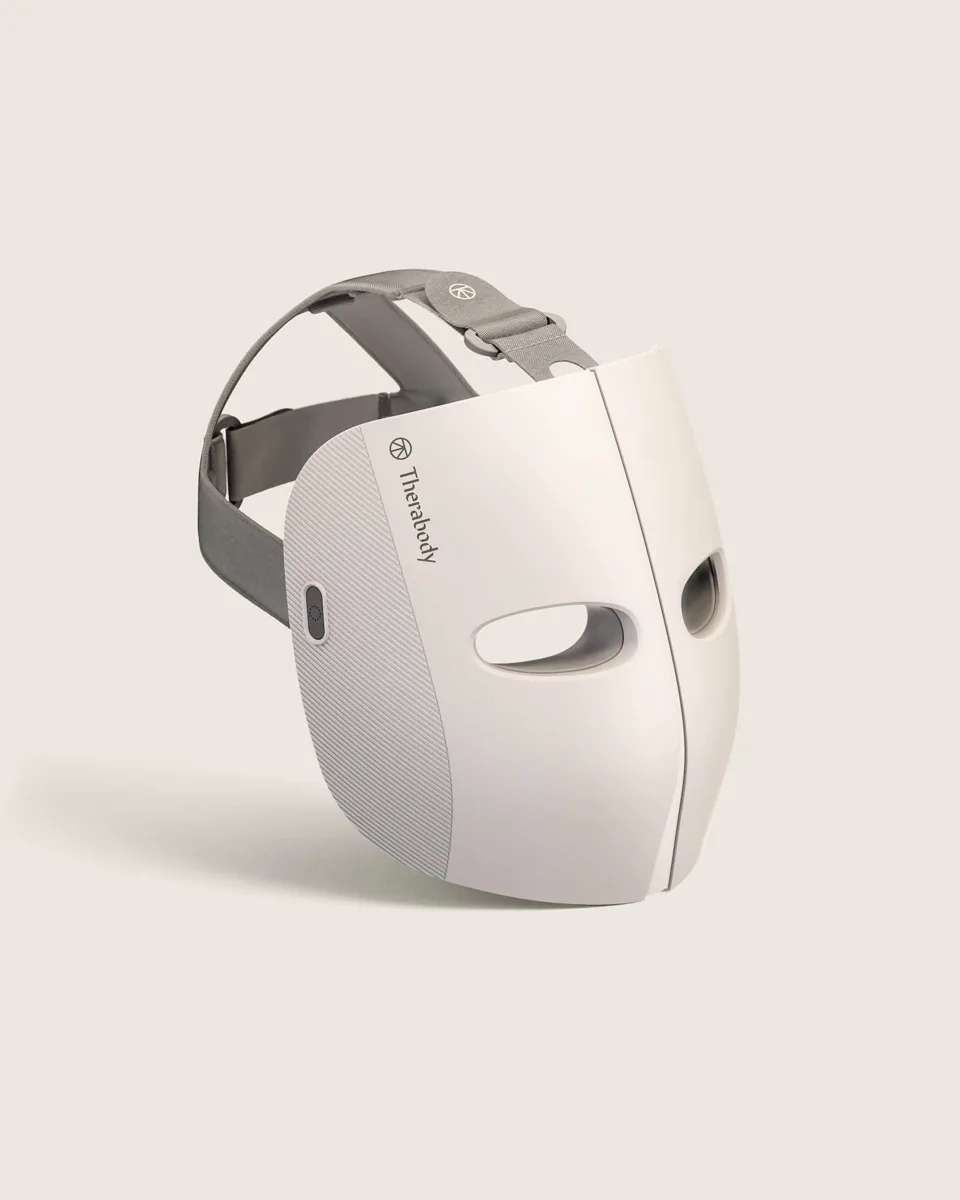 Therabody LED mask product rendering showing outer shell and adjustable head support